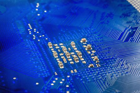 the chip in a computer with many electrical elements, a CPU, a GPU, a microchip in an electronic...