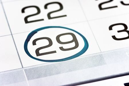 twenty-ninth of the month highlighted on the calendar with a frame close-up macro, mark on the calendar, twenty-ninth dateの写真素材