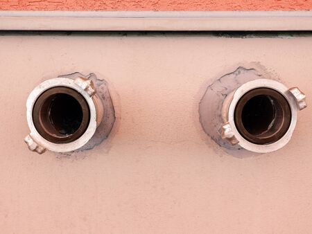 fire hydrant in the wall of the house, the output for connecting the fire hose, fire safety of residential buildingsの写真素材