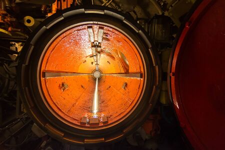 the torpedo room on a combat submarine torpedo launching tube, militaryの素材 [FY310138914844]