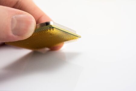 the lower side of modern multi-core multithreaded proceesor with the legs of the contacts, the...