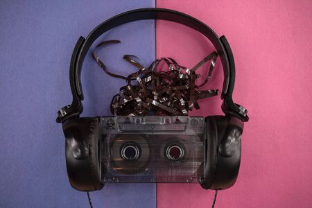 vintage old film music cassette with headphones on a colorful background, music background, music...