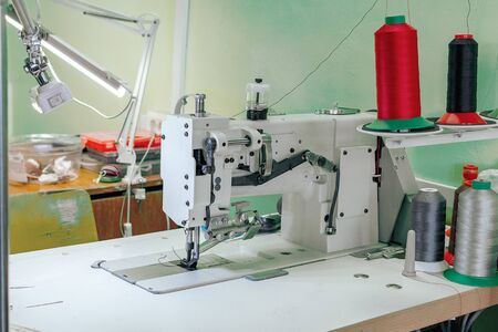 professional production sewing machine close-up, leather production, seamstress, tailorの写真素材