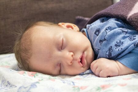 sleeping newborn baby close up