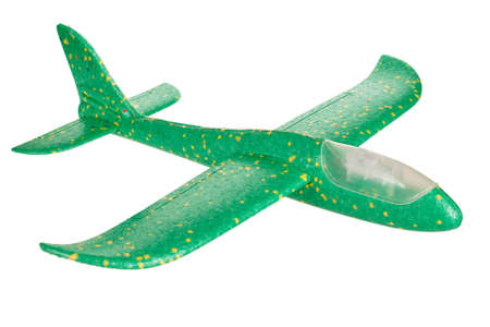 Aircraft made of PVC, foam plastic, airplane glider with removable wing, green, illuminated, isolated on a white backgroundの写真素材