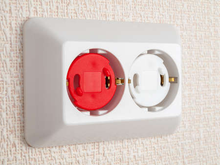protection of sockets from children, electric shock protection plug, close-up, safe house, small...