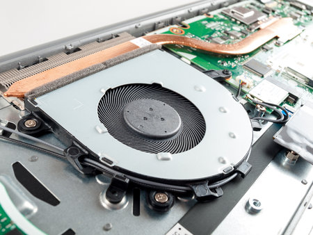 the cooling system in the laptop consists of a fan and radiators with thermal copper tubes with refrigerant, overheating of the processor and video card, freezes and slow operationの写真素材