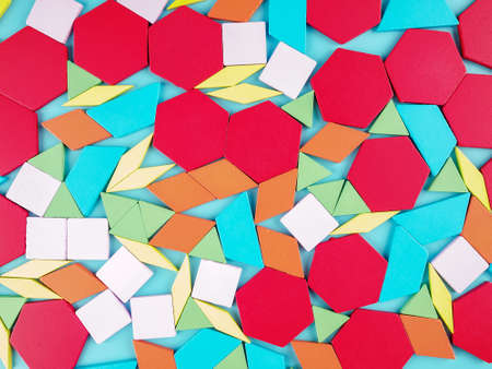 Designer game for kids, toddlers, selective focus, close-up, cubes of different shapes and colors for mosaic collection, picturesの写真素材