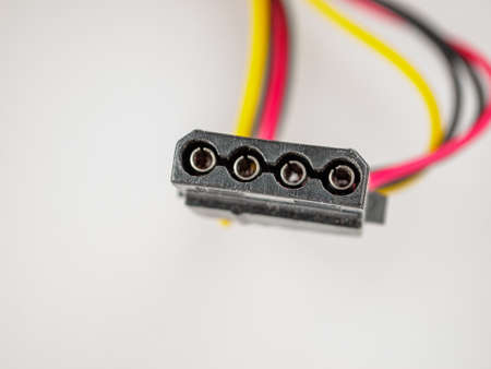 4-pin power connector for all PATA hard disk drives and optical disk drives, peripherals and case fans, selective focus, plug and socketの写真素材