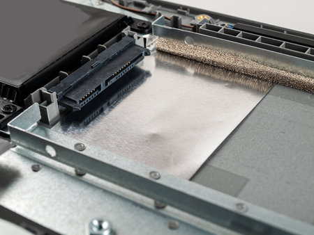 modern ssd drive in a laptop, replacement repair, close-upの写真素材