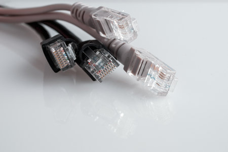 Internet cable for connecting wired high-speed fast Internet at home or in the office close-upの写真素材