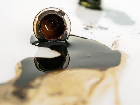 Spilled paint on background texture close-up selective focusの写真素材