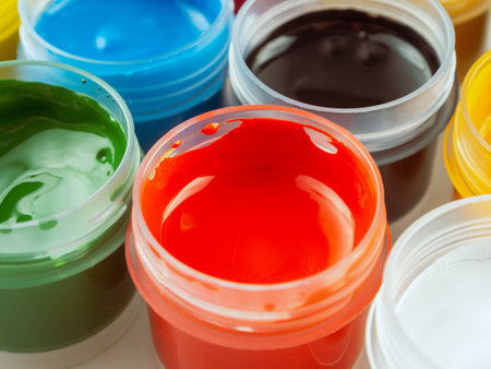 Jars of acrylic gouache paint art painting creativity and development close-upの写真素材