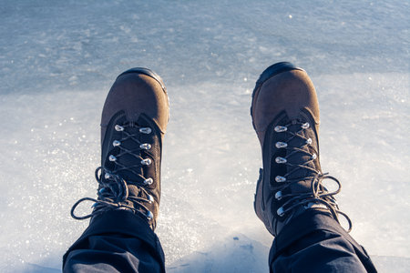a man slipped on ice and fell, slippery road, ice, close-up