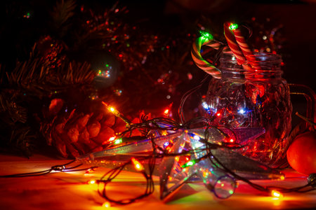 burning garland lights, New Year decorations toys, Christmas preparations at home, selective focus,...