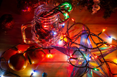 new year's lights garlands and toys decorations, Christmas preparations at home, selective focus, close-upの写真素材