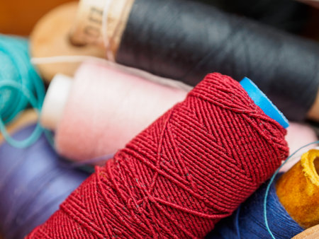 Multicolored Sewing Thread Spools: Vibrant hues are perfect for creating unique textiles and projects.の写真素材