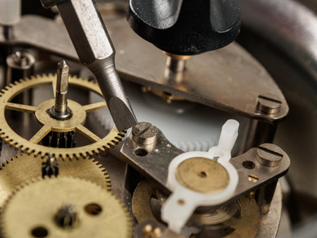 Close-up of a mechanical mechanism with gears, symbolizing watch repair and complex micromechanics.