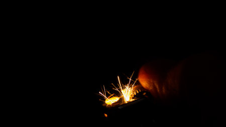 The lighter produces a spark, creating fire. Symbol of danger, potential explosion and fire. Ideal...