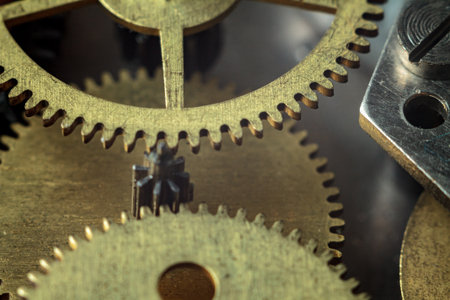 Macro close-up of the gear mechanism: detailed teeth of metal gears, shiny surfaces, complex...