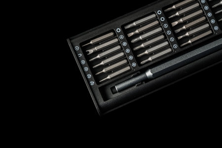 Close-up of various screwdriver heads (bits) ideal for repairing and assembling electronics and...