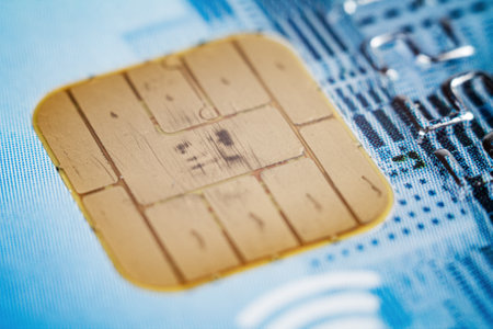 Close-up of a card chip demonstrating contactless payment capabilities.の写真素材