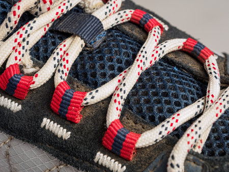 Close-up of colorful shoe laces, perfectly showing texture and detail, suitable for footwear and fashion accessories.の写真素材