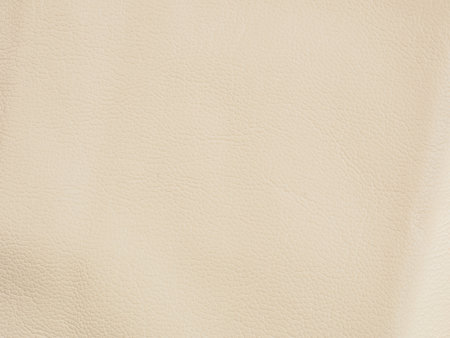 Textured leather macro background showing elegant lines and shades, ideal for stylish and luxurious designs.の写真素材