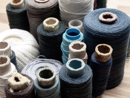 Spools of Thread in Assorted Colors: The perfect accessory for sewing projects, crafts and creating unique clothing.の写真素材