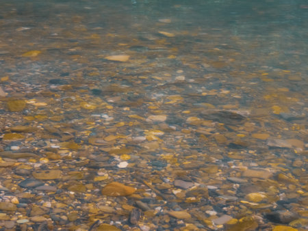 The river, with its rapid flow, creates a breathtaking landscape, reflecting the strength and beauty of the wild nature.の写真素材