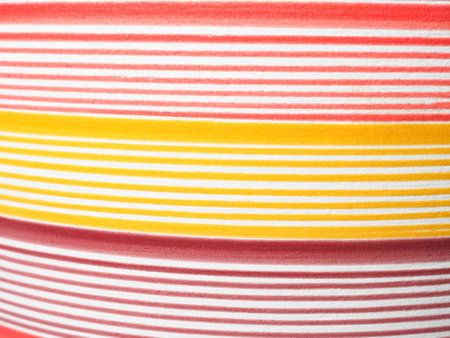 A close-up of a clay pot, highlighting the texture and natural tones of the clay.の写真素材