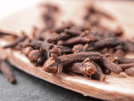 A close-up of aromatic cloves, highlighting the texture and rich color of the spice.の写真素材