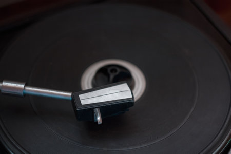 Vintage music player with vinyl and radio creates a retro atmosphere, immersing you in the world of...