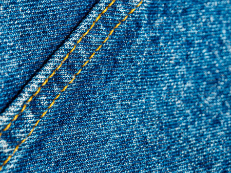 Close-up of denim highlighting texture and detail. An excellent choice for fashion and textile industry themes.の写真素材