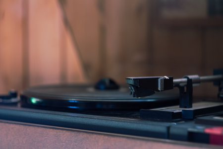 Vintage music player with vinyl and radio creates a retro atmosphere, immersing you in the world of...