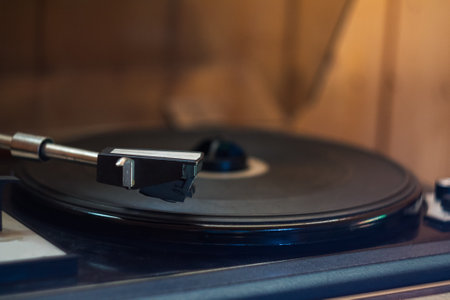 Vintage music player with vinyl and radio creates a retro atmosphere, immersing you in the world of...