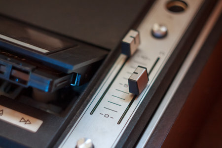 Vintage music player with vinyl and radio creates a retro atmosphere, immersing you in the world of ancient music.の写真素材