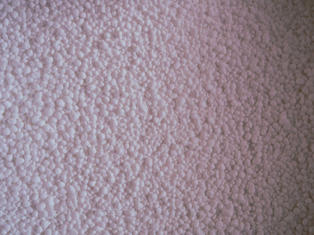 A close-up of chemical beads, highlighting their structure and characteristics, creating a sense of...