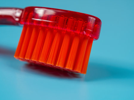 A toothbrush with soft bristles, ideal for gentle care of teeth and gums, ensuring oral health, close-up.の写真素材