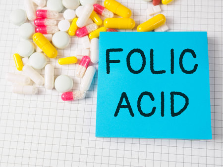 "Folic acid" text title vitamin for the treatment and prevention of diseasesの写真素材