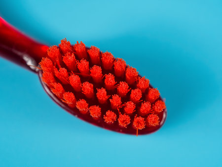 A toothbrush with soft bristles, ideal for gentle care of teeth and gums, ensuring oral health, close-up.の写真素材