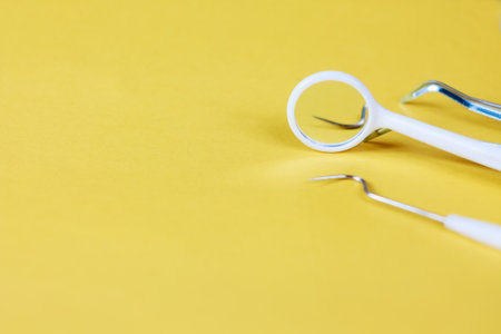 Dental diagnostic tools. Various instruments used by dentists for examination. Oral health, medical equipment, close up.の写真素材
