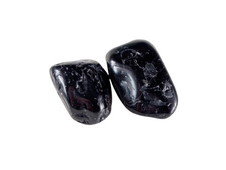 A photograph of tourmaline, specifically the black variety known as schorl (sometimes spelled...