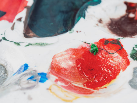 Artist's palette with bright colors, ready to create new masterpieces, close-up.の写真素材