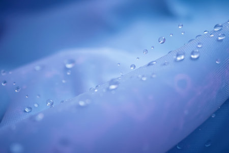 A detailed, magnified view of a waterproof fabric texture, close up.の素材