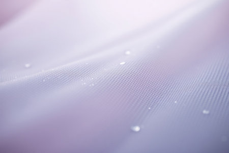 A detailed, magnified view of a waterproof fabric texture, close up.の素材