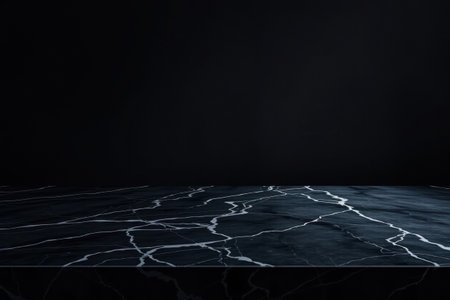 Gray marble tabletop. Black cement backdrop. Minimalist, elegant, product display space.の素材