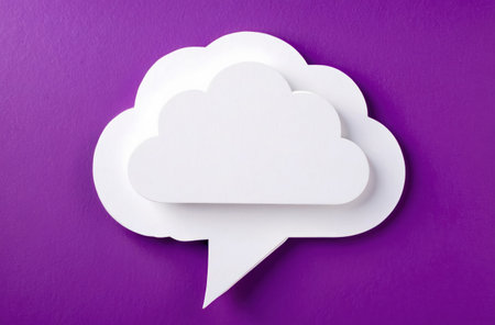 Speech bubble on purple background. Cloud shape, simple design. Great for concepts of talking, sharing or ideas.の素材