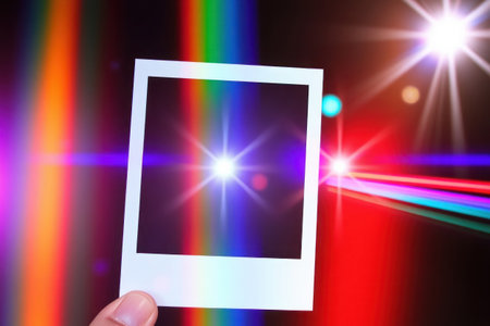 Close-up instant film shot. Light beams, volumetric lighting.の素材