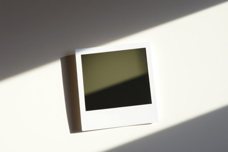 Close-up instant film shot. Light beams, volumetric lighting.の素材